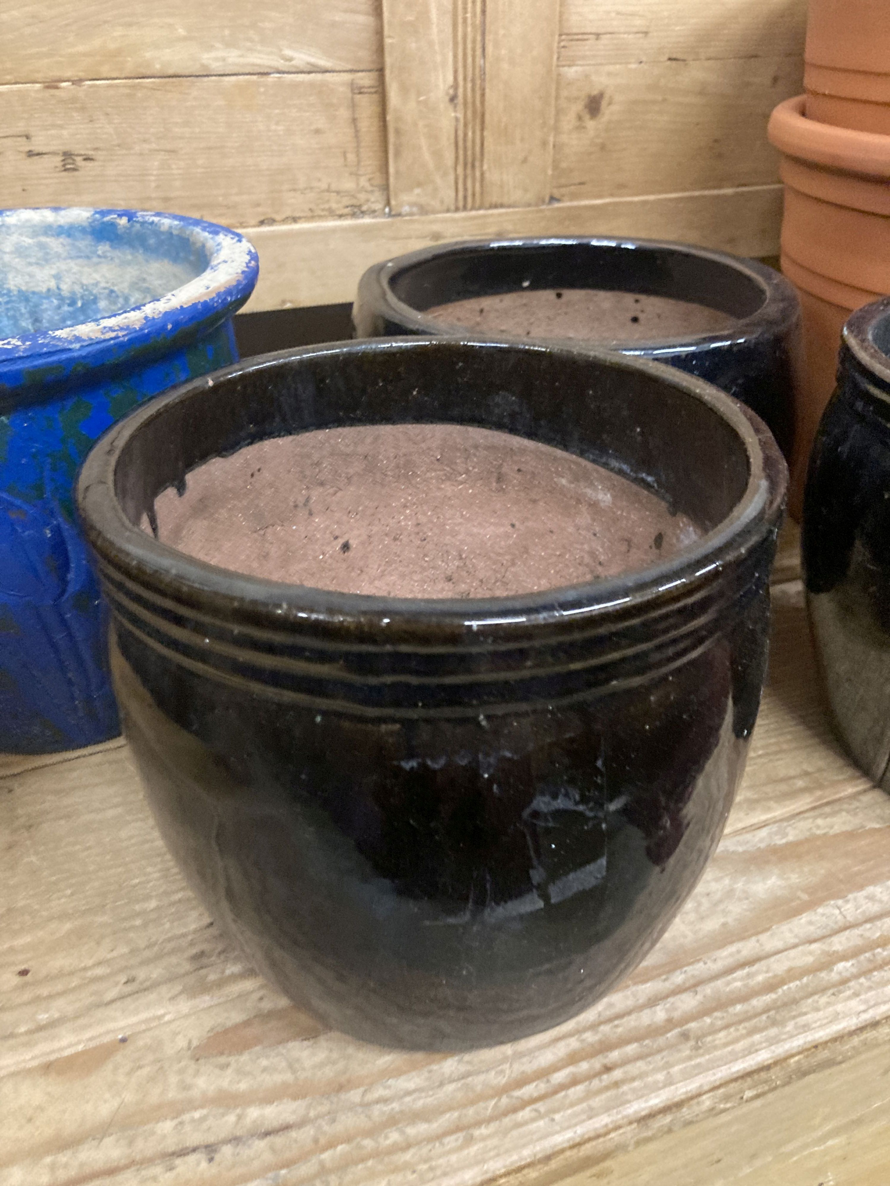 Six assorted garden planters, largest 33cm diameter, height 26cm